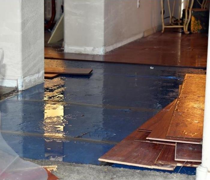 Flooded Phoenix home's wood flooring